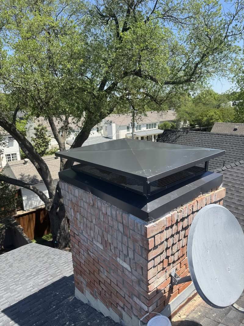 New black chimney cap installed after